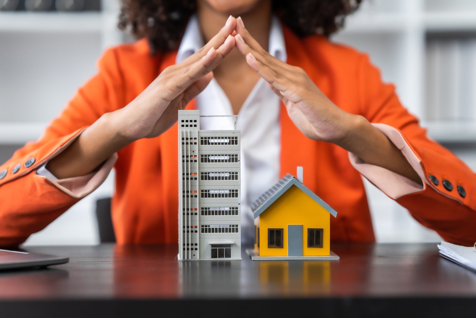 African American realtor working at desk, Housing estate, Vacancy, Prime location, Low Rise