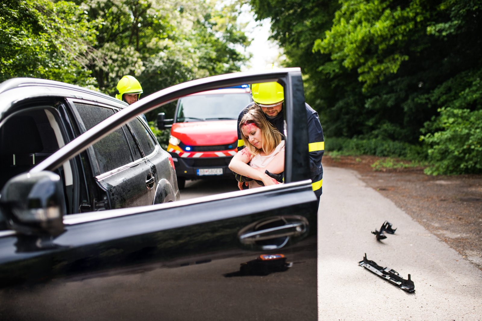 two-firefighters-getting-a-young-injured-woman-out-2025-10-09-11-13-54-utc